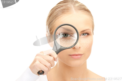 Image of woman with magnifying glass