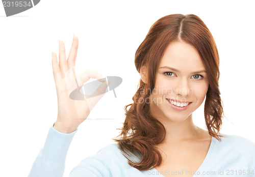 Image of woman showing ok sign