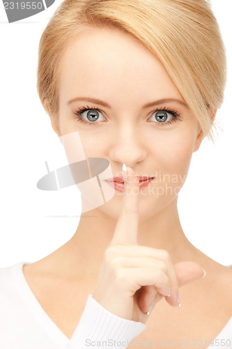 Image of finger on lips