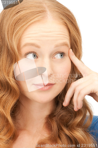 Image of pensive businesswoman over white