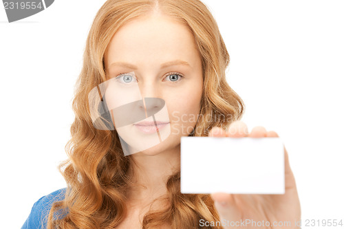 Image of confident woman with business card