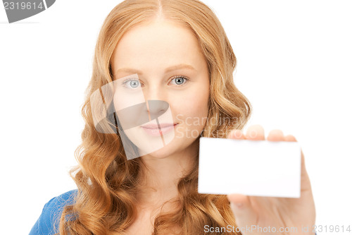Image of confident woman with business card