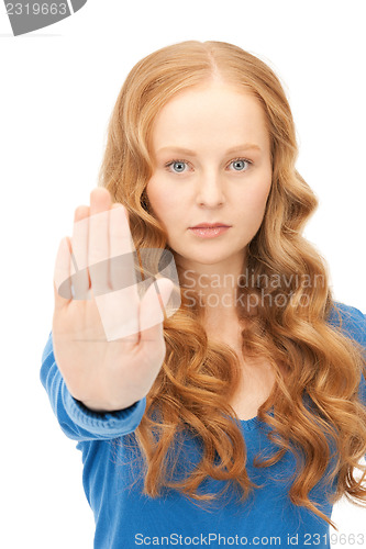 Image of woman making stop gesture