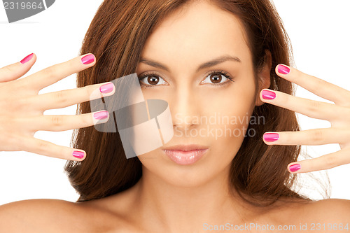 Image of lovely woman with polished nails