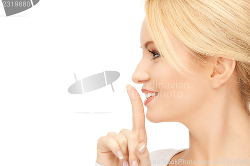 Image of finger on lips