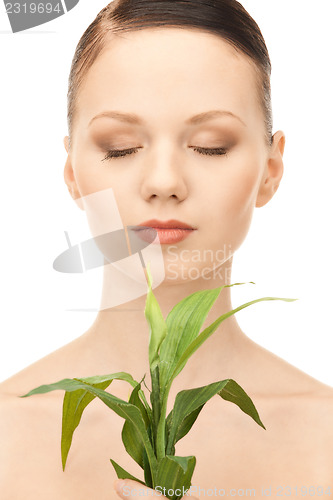 Image of woman with sprout