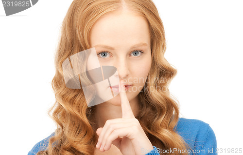 Image of finger on lips