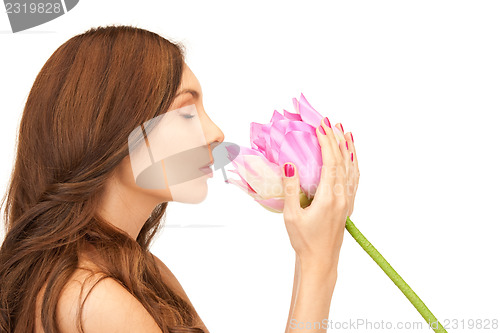 Image of beautiful woman with lotus flower