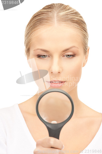 Image of woman with magnifying glass