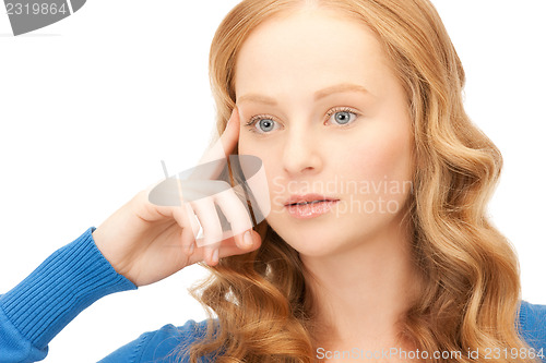 Image of pensive businesswoman over white