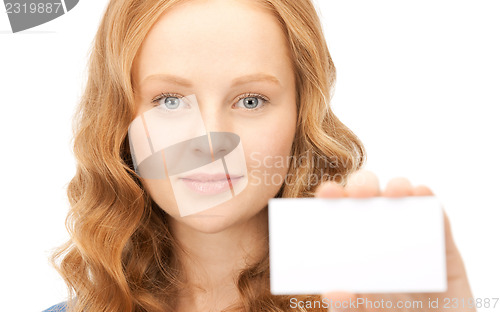 Image of confident woman with business card