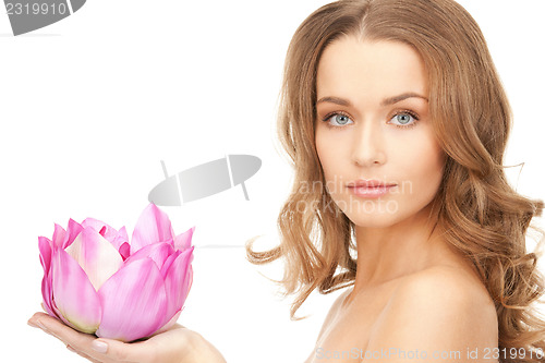 Image of beautiful woman with lotus flower