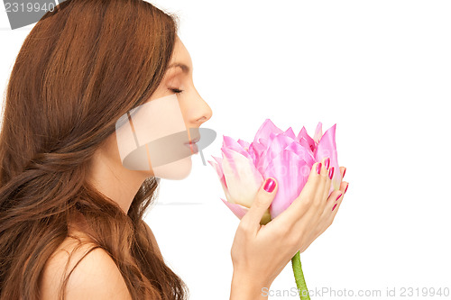 Image of beautiful woman with lotus flower