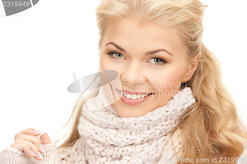 Image of beautiful woman in mittens  