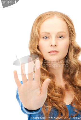 Image of woman making stop gesture