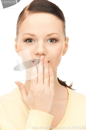 Image of hand over mouth