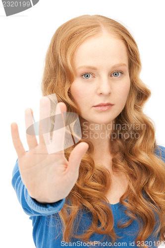 Image of woman making stop gesture