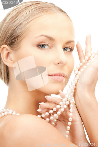 Image of beautiful woman with pearl beads