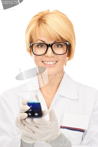 Image of lab worker holding up test tube