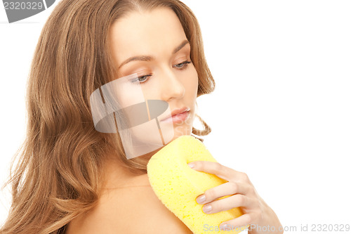 Image of beautiful woman with sponge
