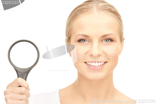 Image of woman with magnifying glass