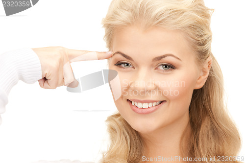 Image of pensive businesswoman over white