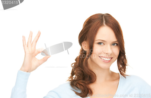 Image of woman showing ok sign