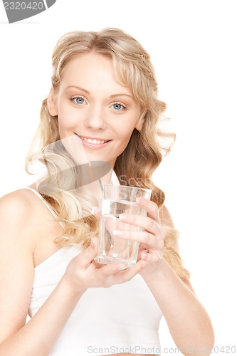 Image of beautiful woman with glass of water