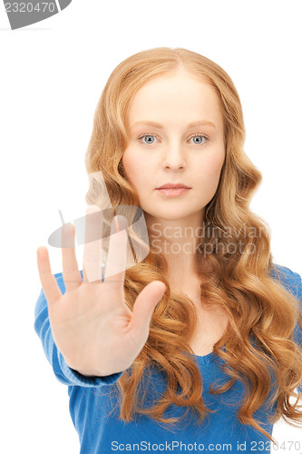 Image of woman making stop gesture