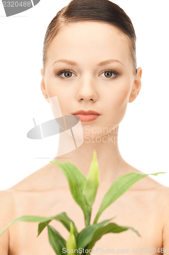 Image of woman with sprout