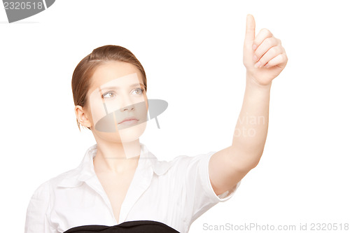 Image of businesswoman working with something imaginary