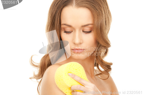 Image of beautiful woman with sponge