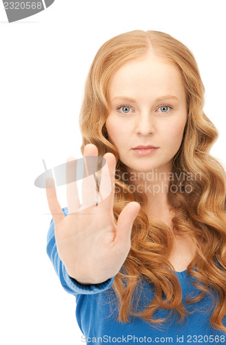 Image of woman making stop gesture