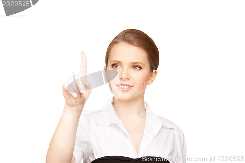 Image of businesswoman working with something imaginary