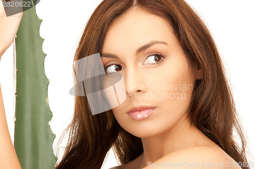 Image of lovely woman with aloe vera