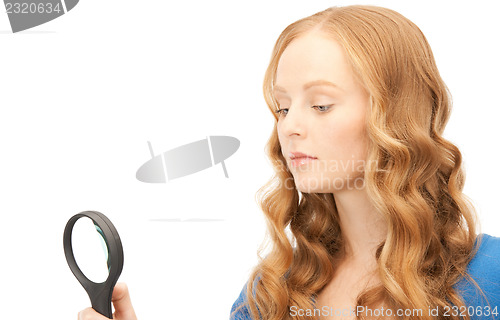 Image of woman with magnifying glass 