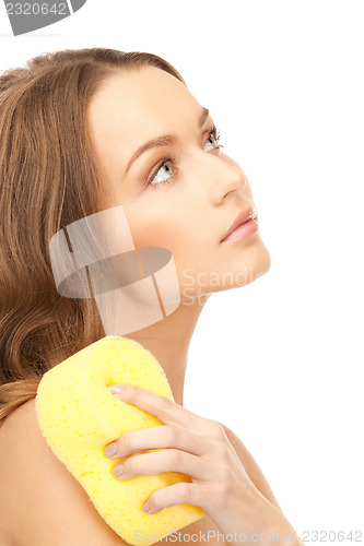 Image of beautiful woman with sponge