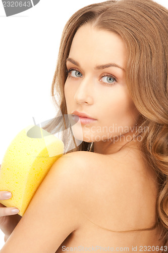 Image of beautiful woman with sponge