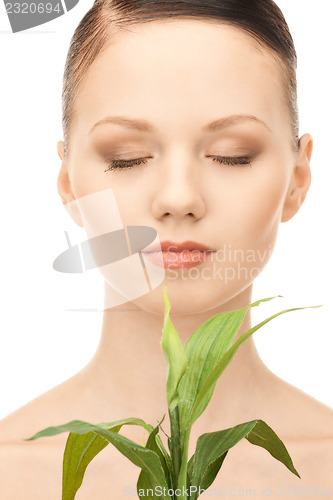 Image of woman with sprout