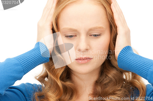 Image of woman with hands on ears