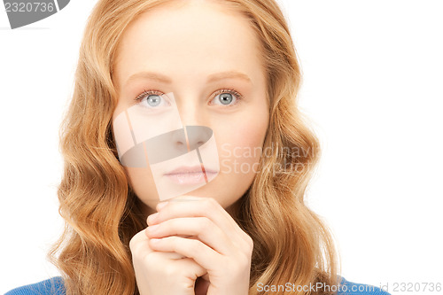 Image of praying businesswoman