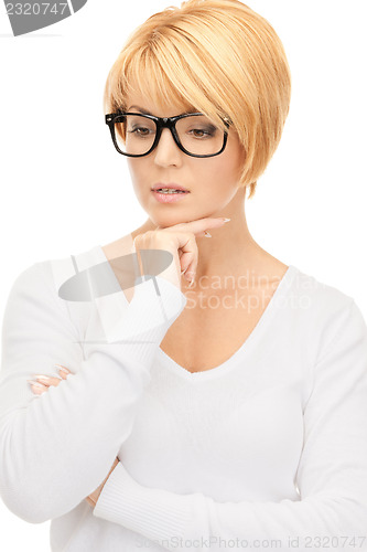 Image of pensive businesswoman over white