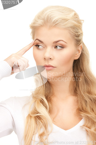 Image of pensive businesswoman over white