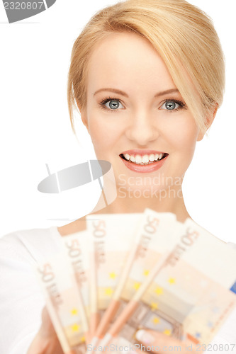 Image of lovely woman with euro cash money