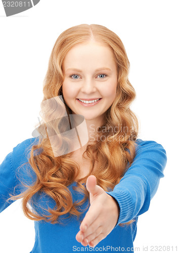 Image of woman with an open hand ready for handshake