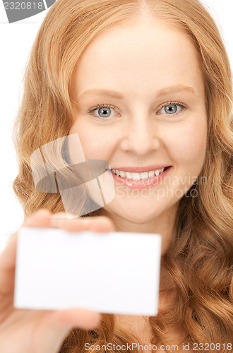 Image of happy woman with business card