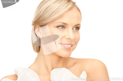 Image of beautiful woman in white mittens