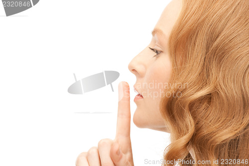 Image of finger on lips