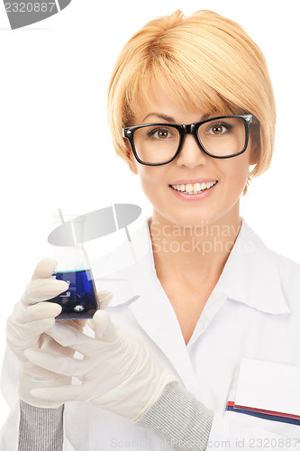 Image of lab worker holding up test tube