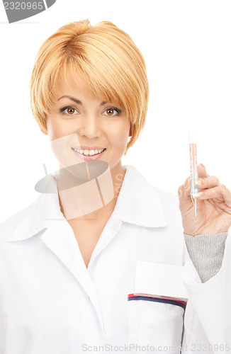 Image of attractive female doctor with thermometer